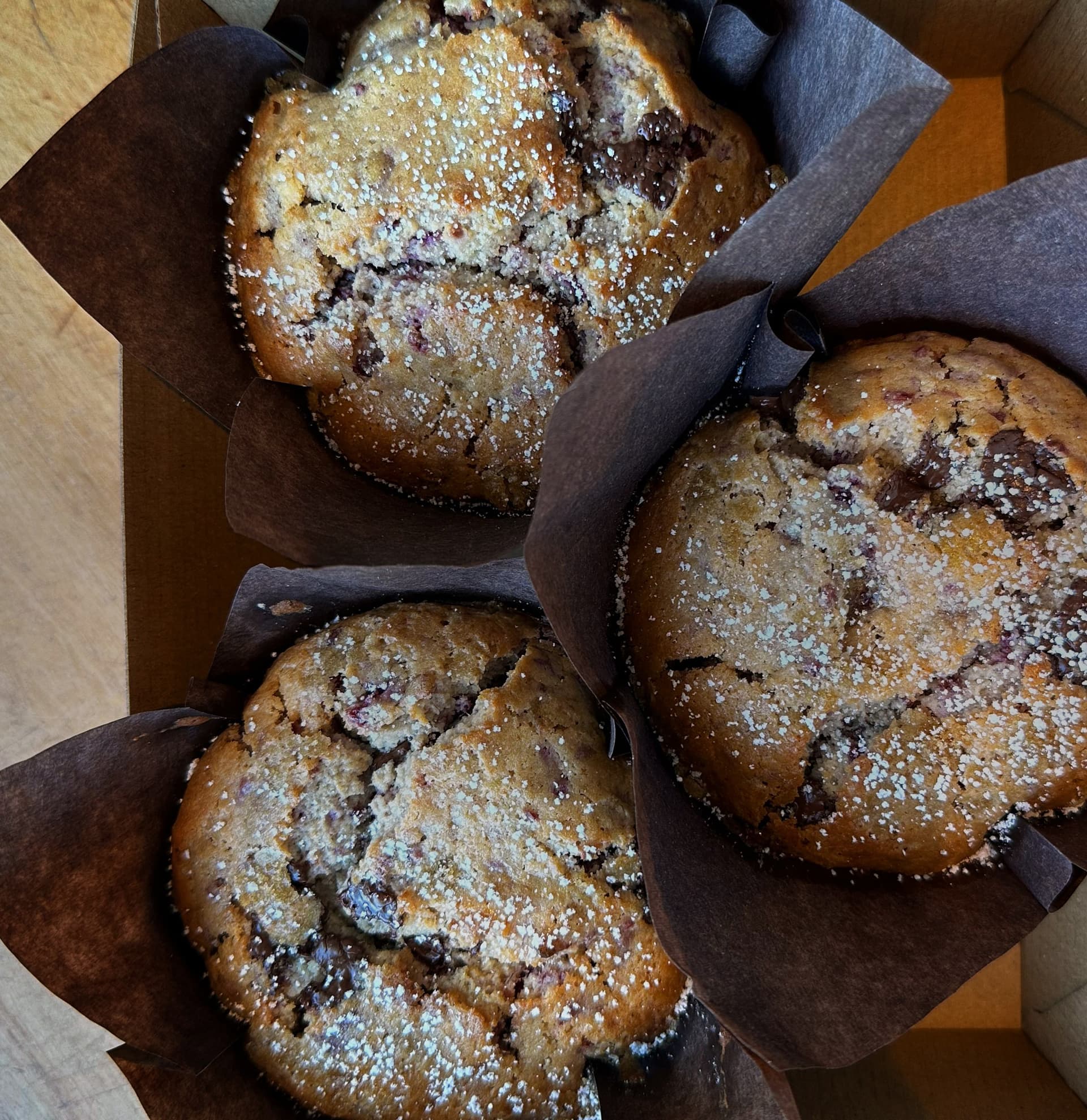 Fresh-baked raspberry and chocolate muffins